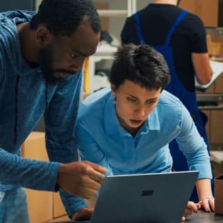 People working on a laptop